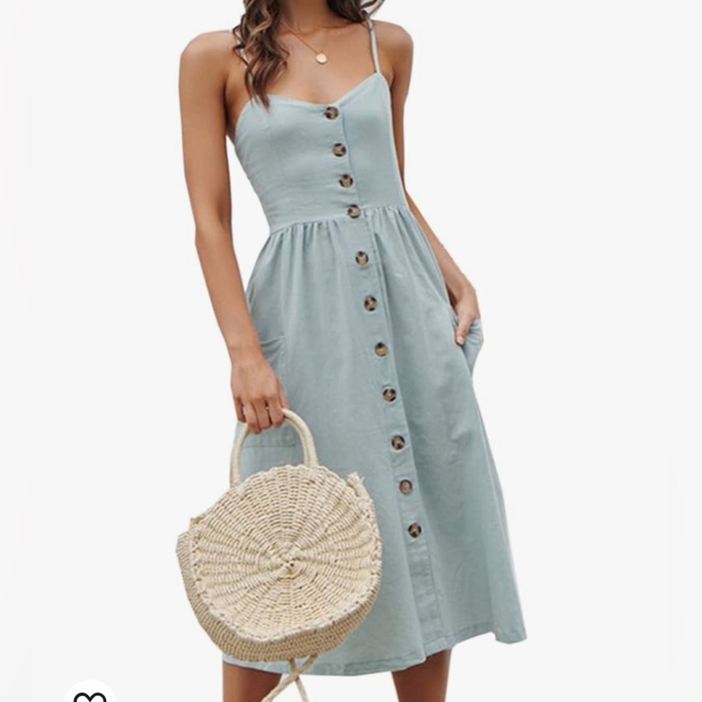 Midi, spaghetti strapped blue dress with nonfunctional button detail.